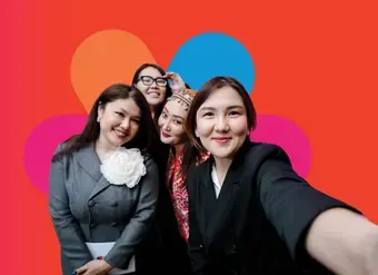 Women pose together for a selfie